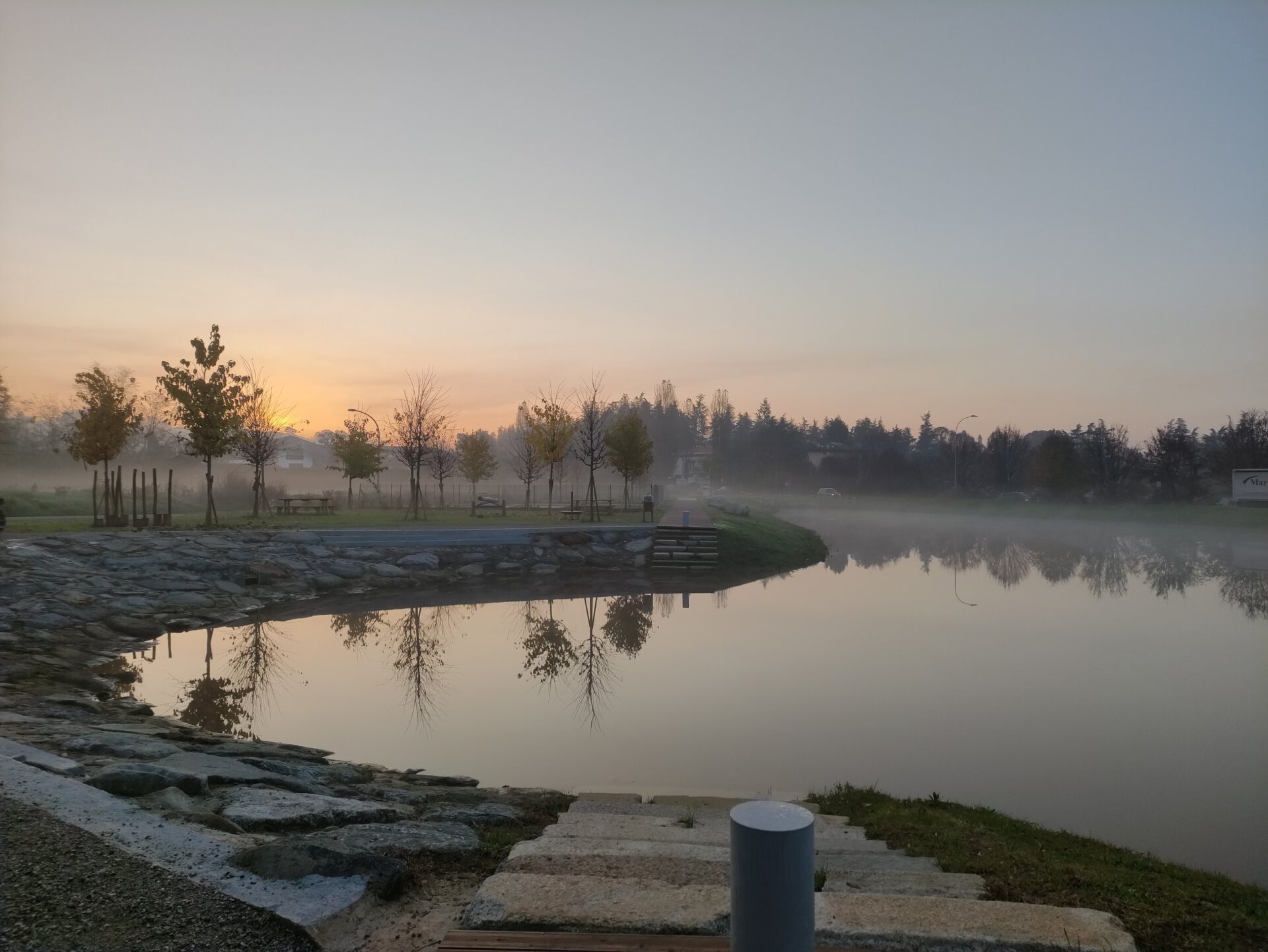 morning fog at retention basin arcore